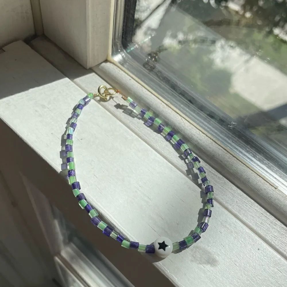 Purple and green anklet